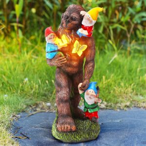 Bigfoot Holding Dwarf Statue w Lighted Butterfly's